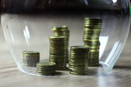a lot of stacks of coins increasing yellow gradually the concept of progress and growth