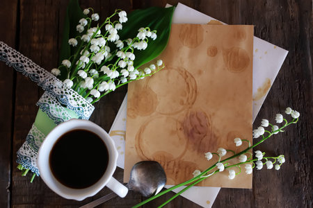 old shabby wooden painted background and a beautiful bouquet of fresh white flowers lily of the...