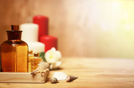 wooden tray with accessories for spa procedures towels small bottle with oil candlesの写真素材