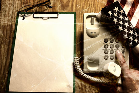 electronic home phone on a wooden table concept rescue call