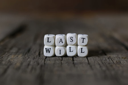 small wooden blocks with letters on the old worn wooden table