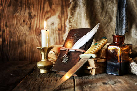 Vintage objects on old wooden shabby retro background conceptの写真素材