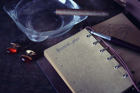 Vintage objects on old wooden shabby retro background conceptの写真素材