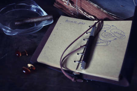 Vintage objects on old wooden shabby retro background conceptの写真素材