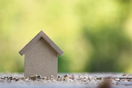 small wooden toy house and building inventory concept construction workの写真素材