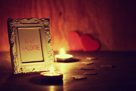 decoration with a symbol of warmth and love of a small paper heartの写真素材