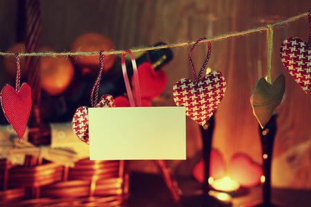 decoration with a symbol of warmth and love of a small paper heartの写真素材