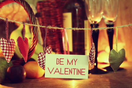 decoration with a symbol of warmth and love of a small paper heartの写真素材