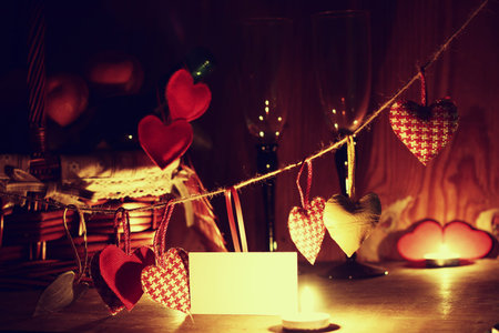decoration with a symbol of warmth and love of a small paper heartの写真素材