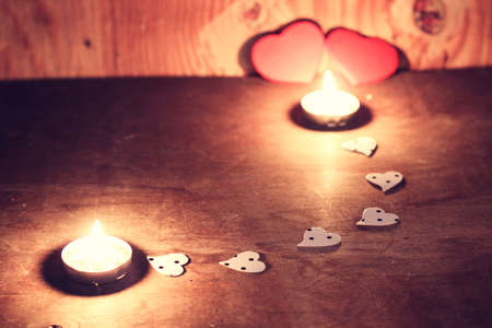 decoration with a symbol of warmth and love of a small paper heartの写真素材