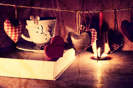 decoration with a symbol of warmth and love of a small paper heartの写真素材