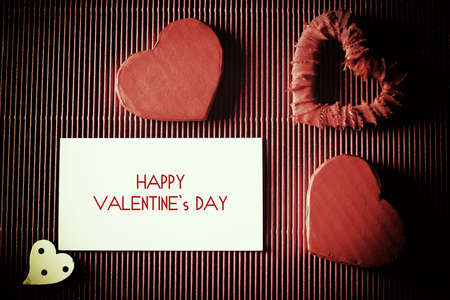 decoration with a symbol of warmth and love of a small paper heartの写真素材