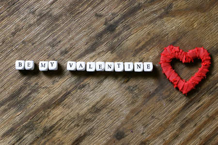 decoration with a symbol of warmth and love of a small paper heartの写真素材