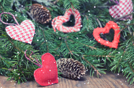 decoration with a symbol of warmth and love of a small paper heartの写真素材