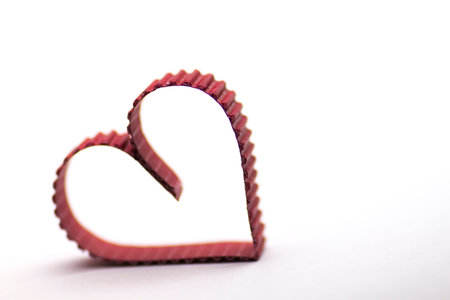 decoration with a symbol of warmth and love of a small paper heart