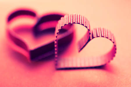 decoration with a symbol of warmth and love of a small paper heartの写真素材