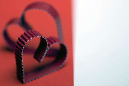 decoration with a symbol of warmth and love of a small paper heartの写真素材