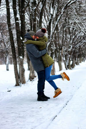 young student in a winter landscape on a sunny nice dayの写真素材