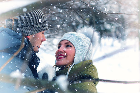 young student in a winter landscape on a sunny nice dayの写真素材