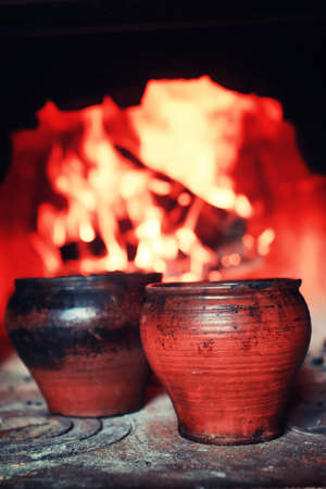 bright flame of burning fire in the oven before cookingの写真素材