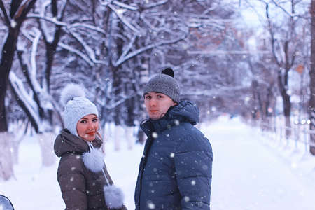 young student in a winter landscape on a sunny nice dayの写真素材