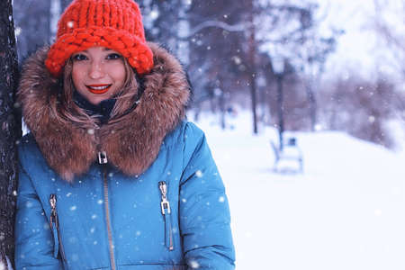 young student in a winter landscape on a sunny nice dayの写真素材