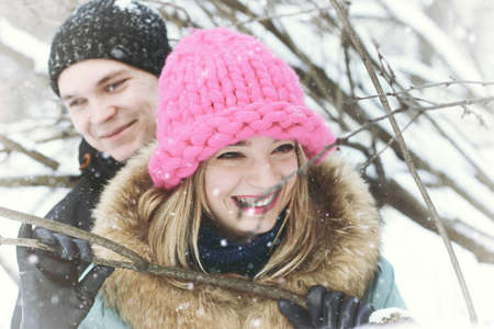 young student in a winter landscape on a sunny nice dayの写真素材