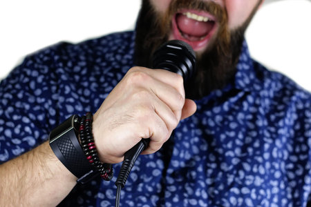 close-up portrait of a handsome bearded man posing on cameraの写真素材