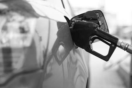 gun filling unit on the fuel tank filling inserted in the machineの写真素材