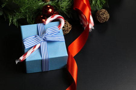 Christmas sweet cane sticks with satin ribbon tied aroundの写真素材