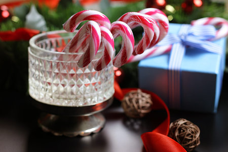 Christmas sweet cane sticks with satin ribbon tied aroundの写真素材