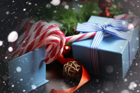 Christmas sweet cane sticks with satin ribbon tied aroundの写真素材