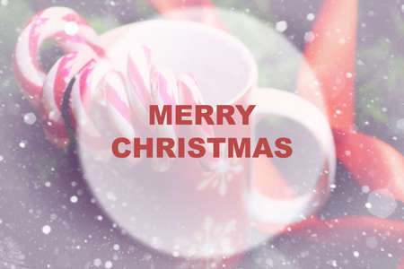 Christmas sweet cane sticks with satin ribbon tied aroundの写真素材