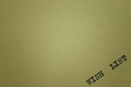 background sheet of yellowish paper with the printed words on a typewriter