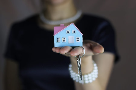 a small one-story layout of decent homes in the hands of sales managerの写真素材