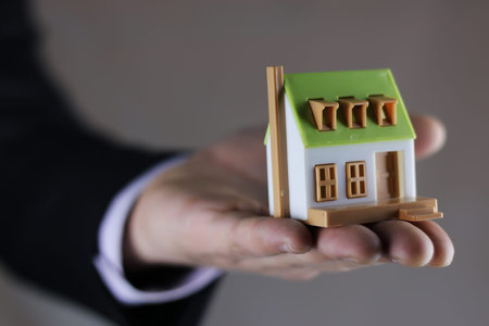 a small one-story layout of decent homes in the hands of sales managerの写真素材