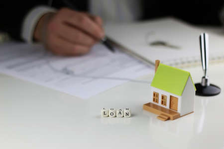 a small one-story layout of decent homes in the hands of sales managerの写真素材