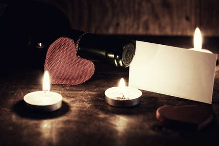 decoration with a symbol of warmth and love of a small paper heartの写真素材