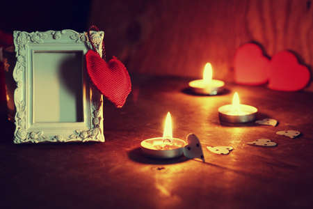 decoration with a symbol of warmth and love of a small paper heartの写真素材