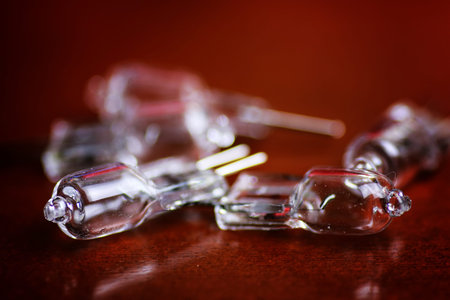 lighting fixtures small transparent diodes on brown table topの写真素材
