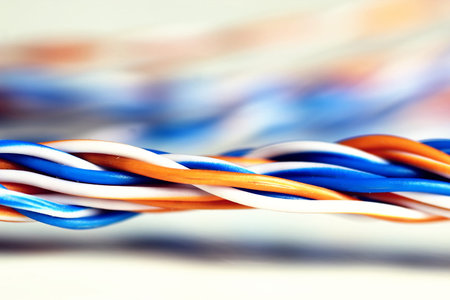 Multicolored computers wires and tv isolated on white background