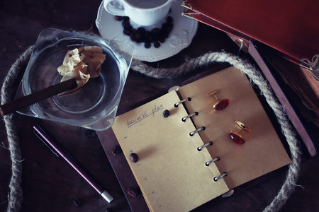 Vintage objects on old wooden shabby retro background concept