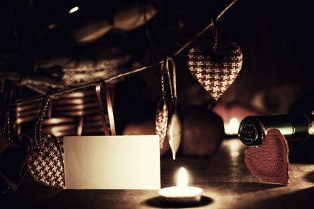 decoration with a symbol of warmth and love of a small paper heartの写真素材