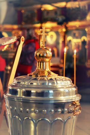 utensils and elements of the process Christian rite of infant baptism in the church
