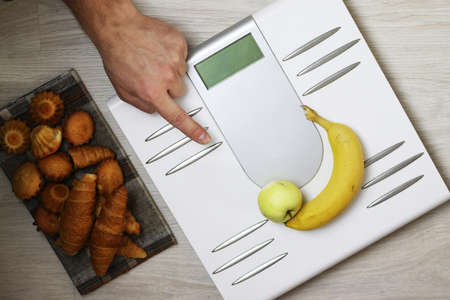 electronic scales and weight loss concept of proper nutrition for weight lossの写真素材