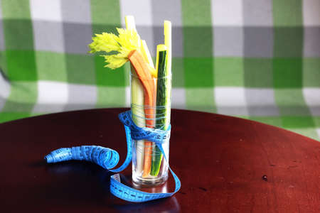 glass with vegetables diet mesaureの写真素材