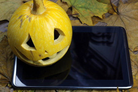 Halloween pumpkin and tabletの写真素材
