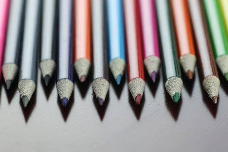 colored pencils on the wooden table concept of preparation for the new school yearの写真素材