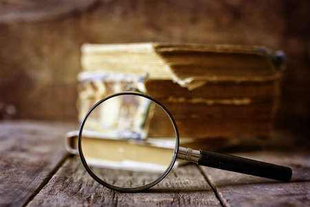 magnifying glass and old bookの写真素材