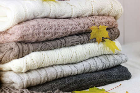 stack of sweaters knitted autumn conceptの写真素材